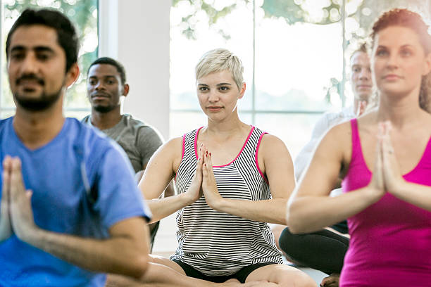 istock Taking a Yoga Class at the Gym 624911934