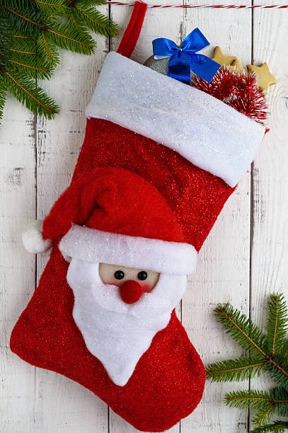 istock Red textile boot a Christmas with Santa's head 624923248