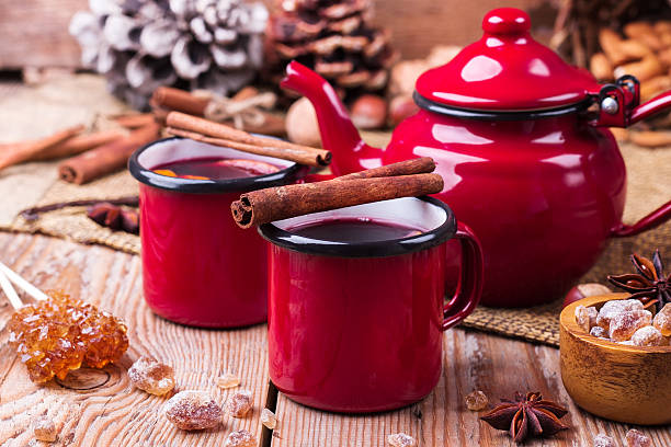 istock Hot mulled wine in a red mug for winter holidays 624923536