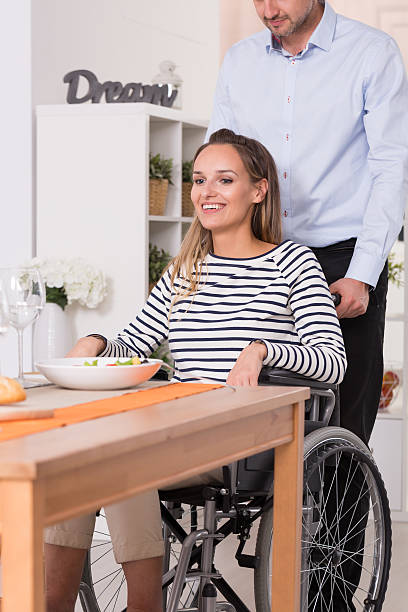 istock Smiling women on a wheelchair 624924328