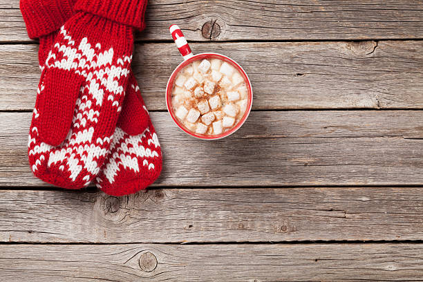 istock Christmas background with mittens and hot chocolate 624924726