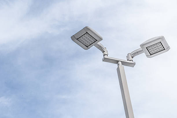 istock LED street lamp post with blue sky cloud. 624925134