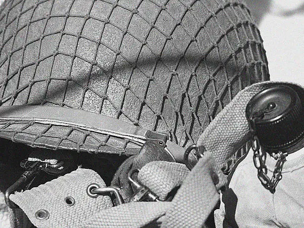 World war 2 helmet and drinking can