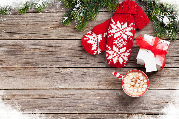 istock Christmas fir tree, mittens, hot chocolate with marshmallow 624925340