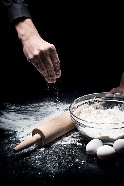 istock Close up of mans hands baking 624925584