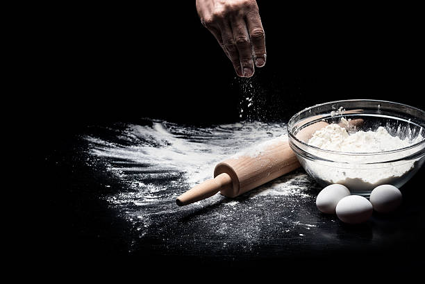 istock Close up of mans hands baking 624925690