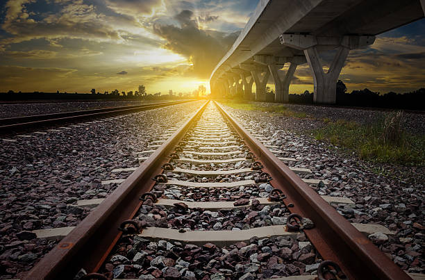 istock railroad for transportation and  elevated expressway with sunlig 624926000