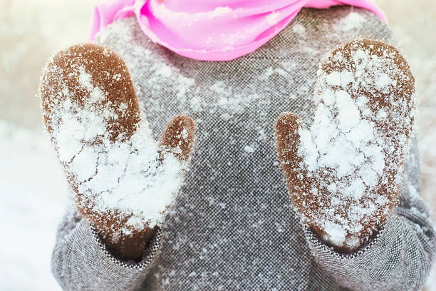 Woman in the snowy mitten horizontal