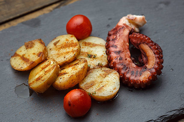 istock Grilled potato with sea food octopus 624945468
