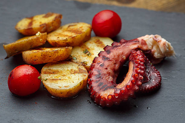 istock Grilled potato with sea food octopus 624945618