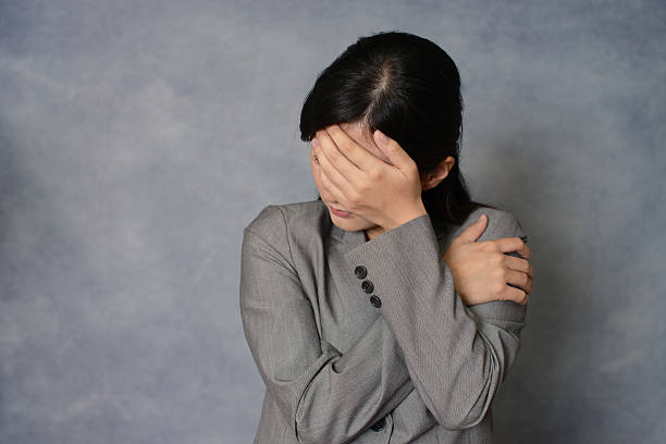 istock Disappointed Asian business woman 624945822