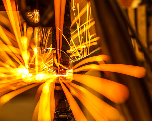 istock robots welding in a car factory 624947180