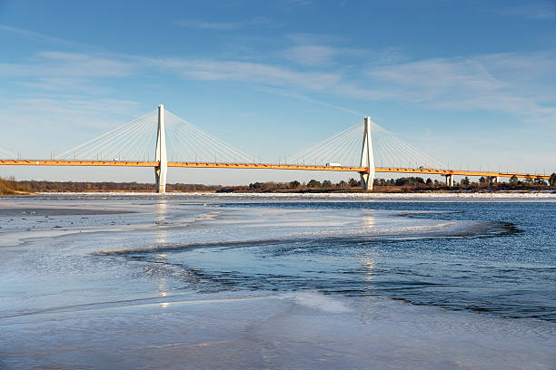 istock modern bridge over the frozen river 624948370