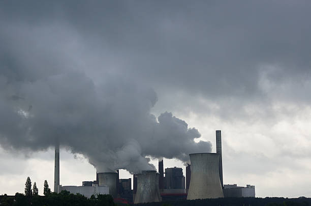 istock power plant polluting the air 624950882