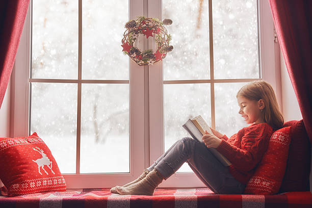 girl sitting by the window