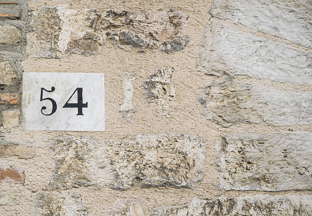 istock House number 54 sign. 624956440