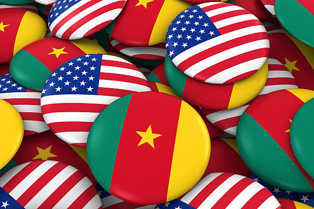istock USA and Cameroon Flag Badges Background 624958860