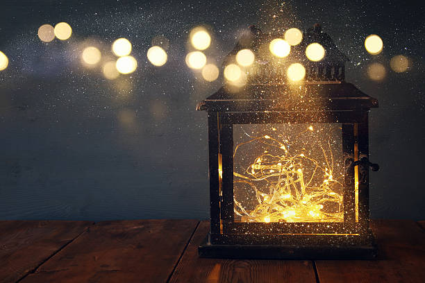 istock low key image of fairy lights inside old lantern 624964844