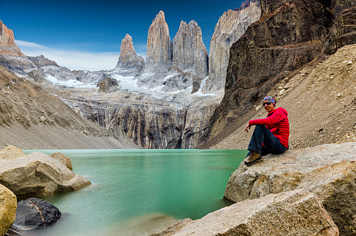 Young adult women resting at Las Torres, Parque national Torres del Paine, Patagonia, Chile