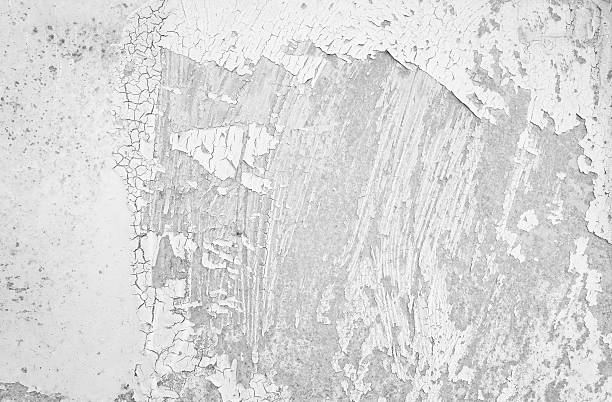 istock Close-up gray white grunge old wall cracked painted texture background 624966532
