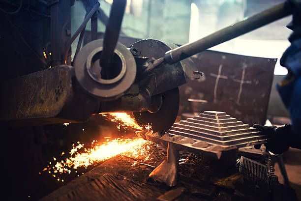 istock Factory worker, labourer cutting and grinding steel 624968600