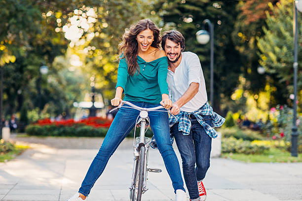 istock Lovely couple with a bike 624978056