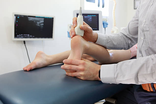 ultrasound of caucasian child's heel - diagnosis stock photo