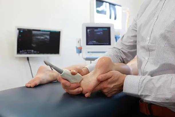 Photo of ultrasound of caucasian child's heel - diagnosis