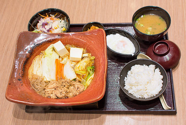 istock Japanese lunch set in wooden bowls 624986124