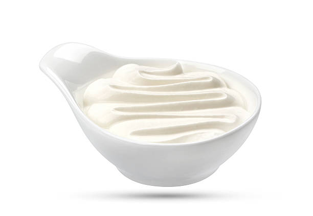 istock Sour cream in bowl isolated on white background 624987332