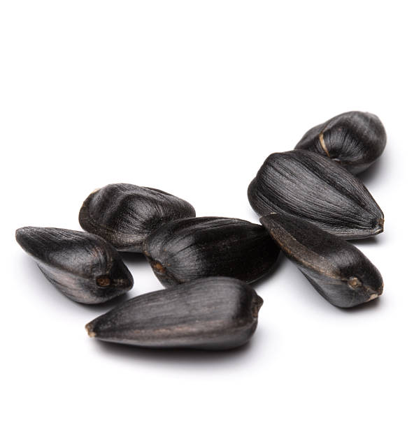 istock Sunflower seeds  isolated on white background close up 624992020