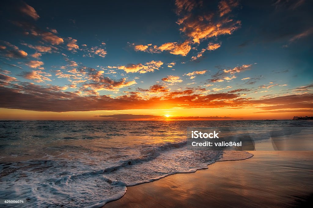 Sunrise over the beach Sunrise over the beach. Punta Cana Sunrise - Dawn Stock Photo