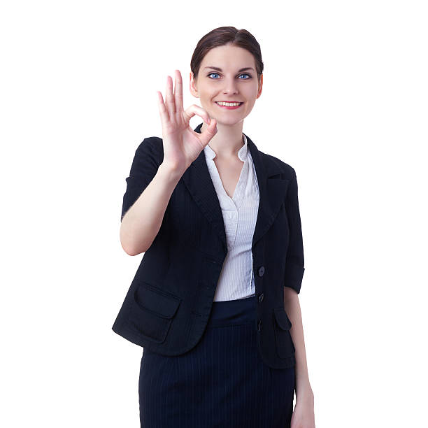 istock Smiling businesswoman standing over white isolated background 625006442