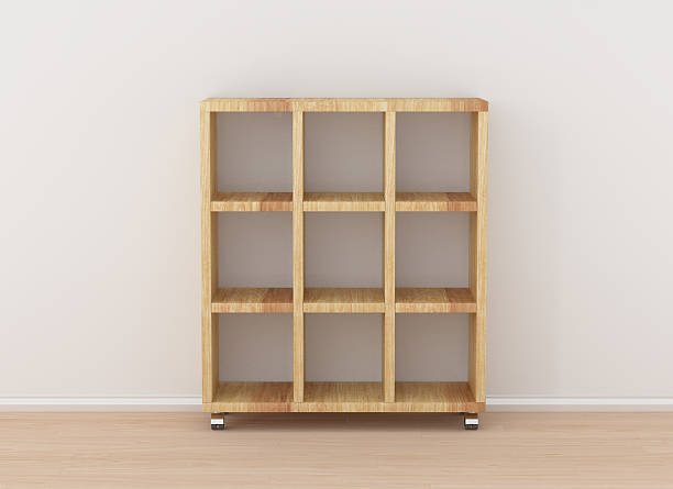 istock Book rack isolated against the white wall in bright interior. 625007244