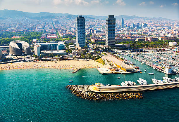 aerial view of docked yachts in port. barcelona - port de barcelona imagens e fotografias de stock