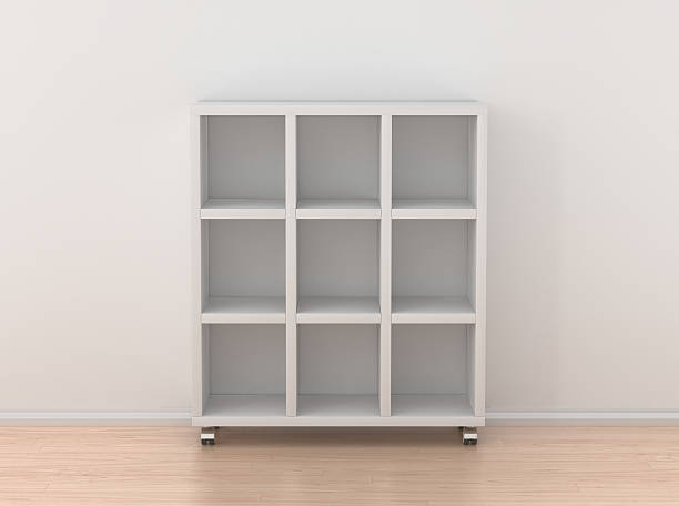 istock Book rack isolated against the white wall in bright interior. 625007406
