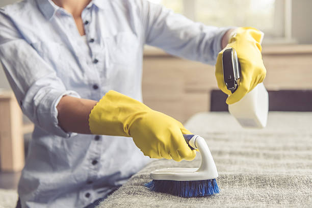 istock Woman cleaning her house 625007728