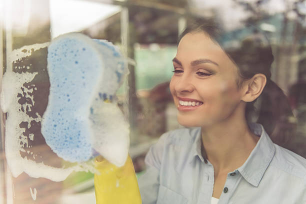 istock Woman cleaning her house 625008170