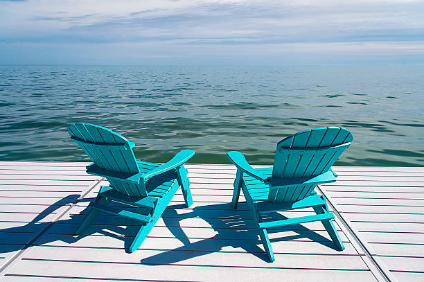 istock Muskoka Chair on a Summer Dock 625008614