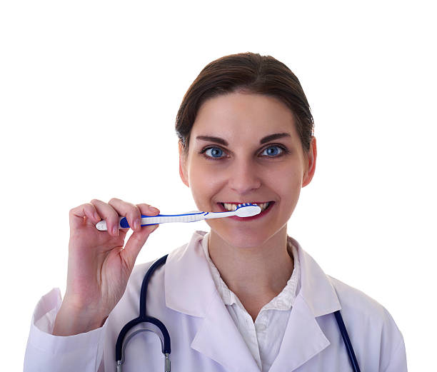 istock Female doctor assistant scientist in white coat over  isolated background 625009160