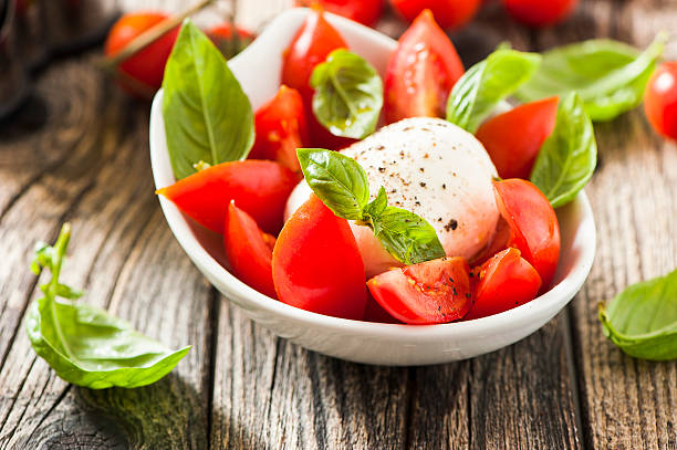 istock Caprese salad with mozarella cheese, tomatoes and basil 625009872