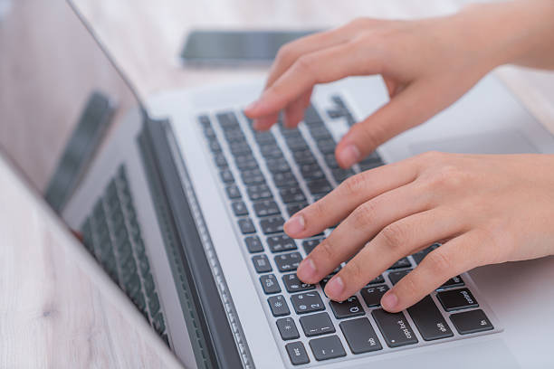 istock Close-up of hands typing on a keyboard 625011734