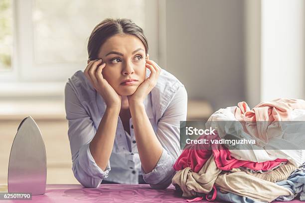 Woman Ironing Clothes Stock Photo - Download Image Now - Iron - Appliance, Clothing, Women