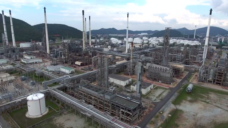 AERIAL:flying over an oil refinery