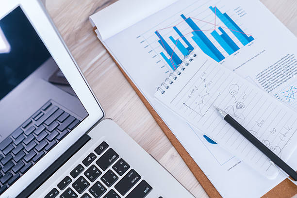istock Financial charts with laptop 625041644