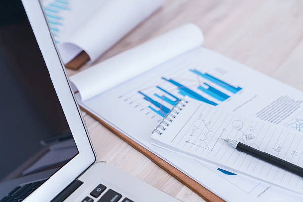 istock Financial charts with laptop 625041674