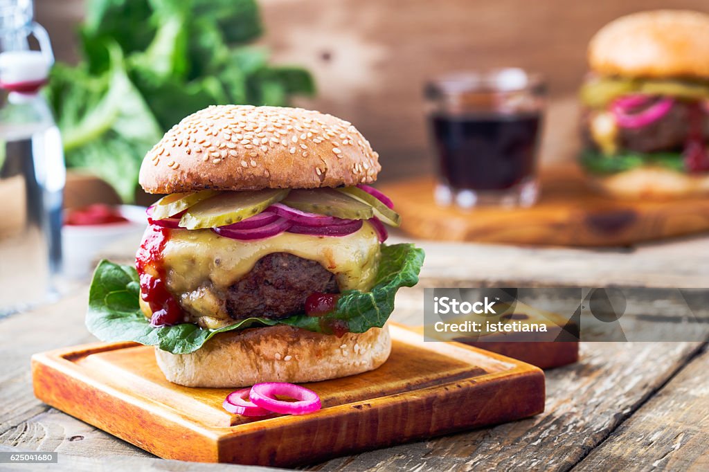 Burger with  gherkins, red onion and lettuce Onion Stock Photo