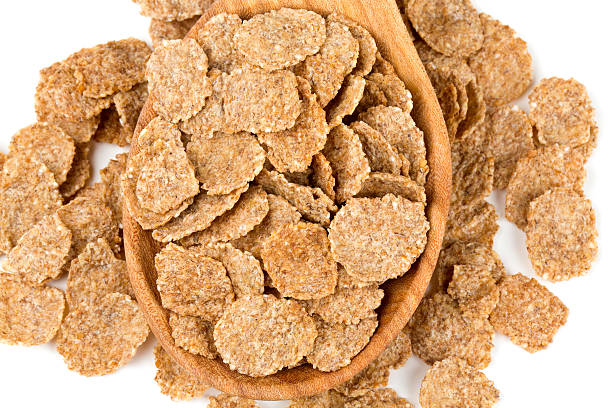 istock pile of bran flakes isolated on white 625042136