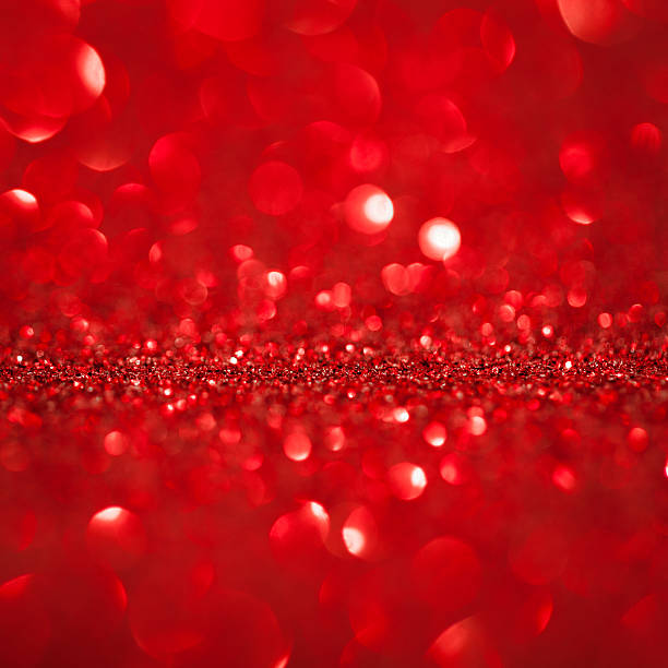 istock shining red glitter. christmas background 625048684