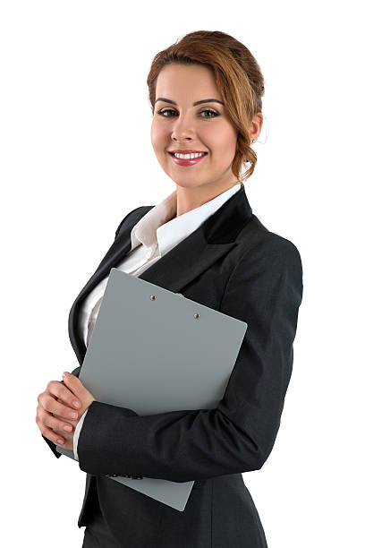 porträt von lächelnden geschäftsfrau hält graue clipping pad - ceo greeting suit meeting stock-fotos und bilder